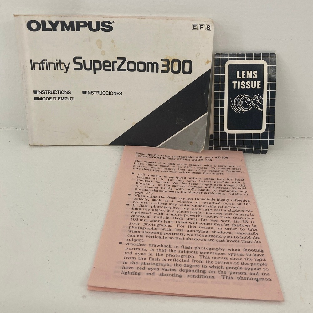 Olympus Infinity SuperZoom 300 Camera Instruction Manual AZ-300 Tips Lens Tissue